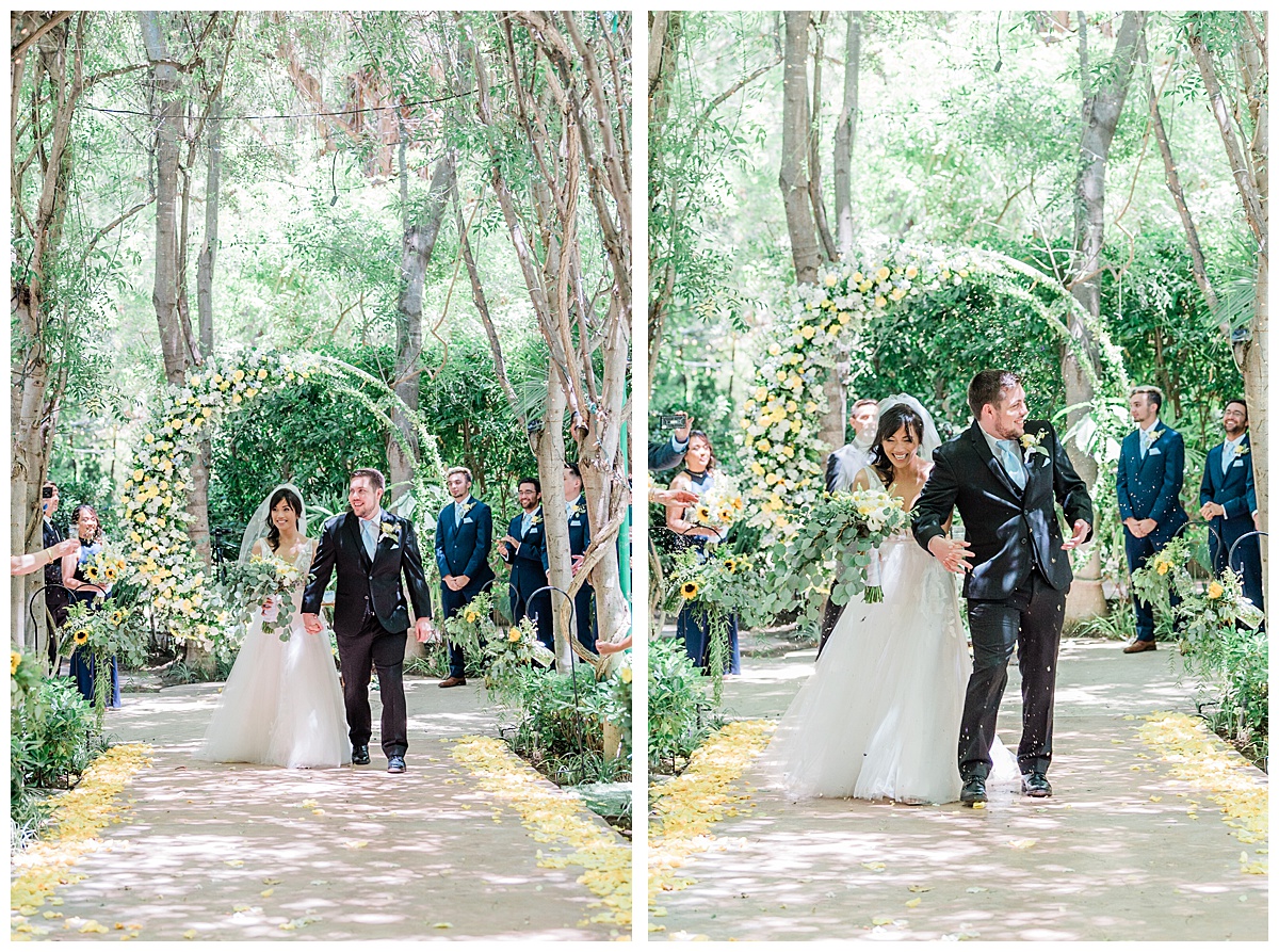 bride and groom walking up the aisle at Hartley Botanica
